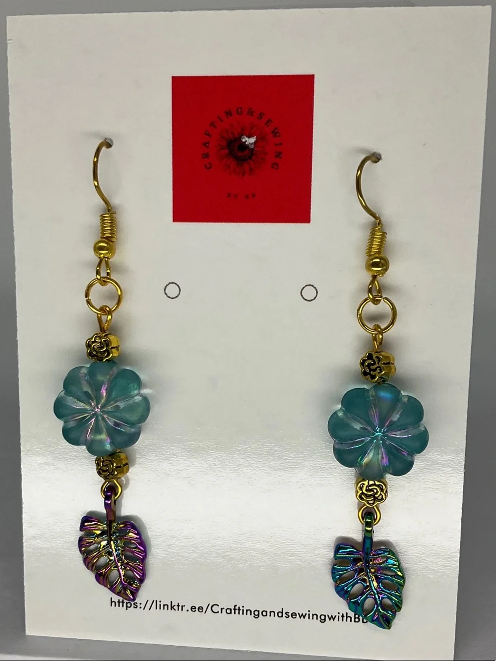 Handmade Teal Flower Dangle Earrings with Iridescent Leaf Charms